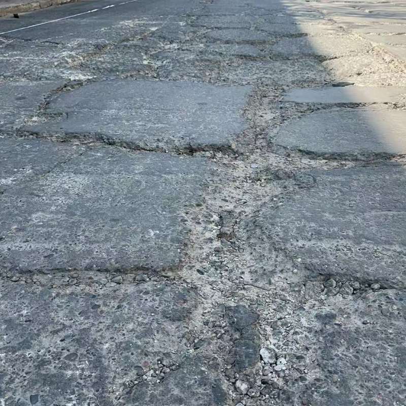 嘉定路面起砂露石子修补料